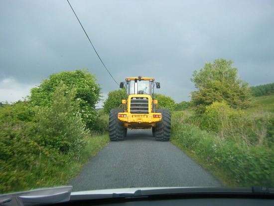 1_1276097557_stuck-behind-a-tractor-on-a-one-lane-road.jpg