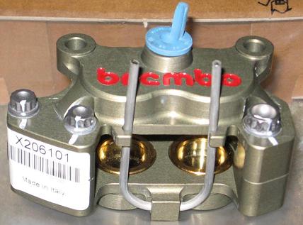 20_Brembo_Racing_P4_24_billet_rear_caliper_w_quick_change_pads__X20.61.01__4_piston__24mm__1.jpg