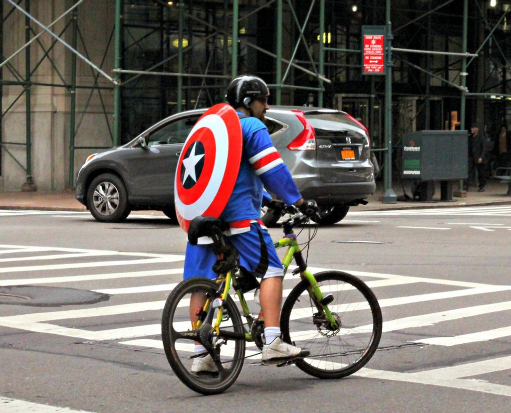 captain_america_riding_a_bike_by_jaydvega89-d5j9oz2.jpg