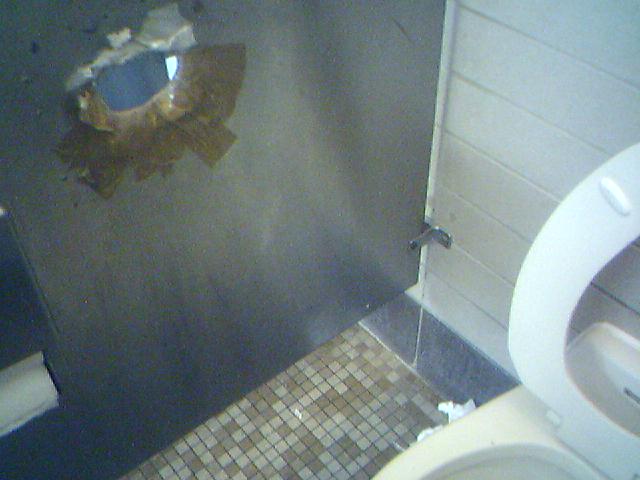 glory_hole_in_washroom_155966507[1].jpg