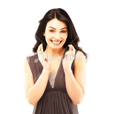 istockphoto_9260720-excited-beautiful-young-woman-with-fingers-crossed.jpg