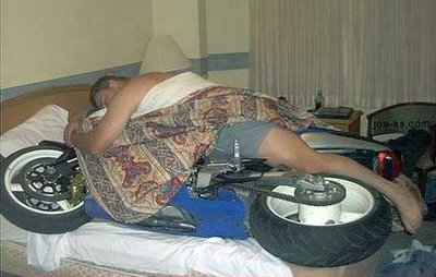 sleeping-with-the-bike-jpg.230352.jpg